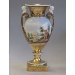 Early 19th Century Continental porcelain two handled urn, enamelled with Italianate country