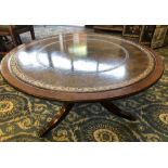 Large reproduction mahogany leather topped circular coffee table of Georgian design, 92cm diameter x