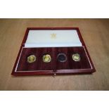 Royal Mint coin box with three half sovereign type coins (each weighing over 4grams)