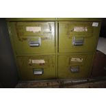 Metal four drawer cabinet containing two Stanley planes and mixed items