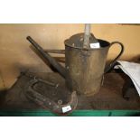 Vintage watering can and Woden cramp