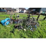 Two vintage folding bicycles and a quantity of bicycles and parts