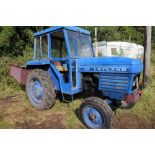 British Leyland 245 tractor Reg KSM258P, 5384(7) hours with bucket trailer