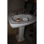 Shanks hand basin, two other hand basins and a toilet