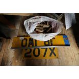 Bag wooden clothes pegs and two number plates