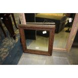 Carved wood framed mirror