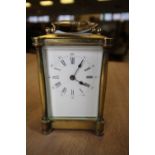 French brass five glass carriage time piece