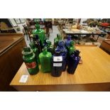 Quantity of Victorian coloured glass medicine bottles