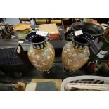 Pair of Royal Doulton vases (af)