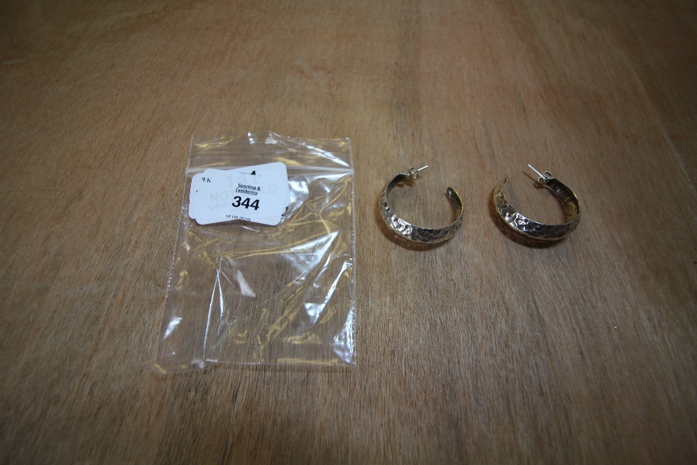 Pair of hammered silver hoop earrings