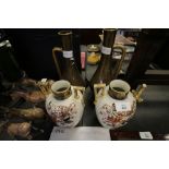 Pair of Continental gilded ewers (A/F) and pair of Victorian vases