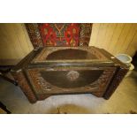 Carved wooden camphor chest