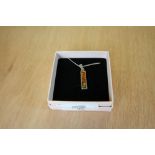 Silver and amber three-stone pendant and chain