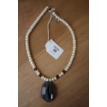 Druzy agate pendant on pearl and Swarovski crystal necklace
