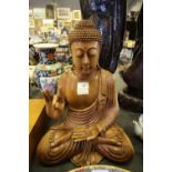 Wooden sitting Buddha