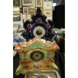 Two 1920s pottery mantel clocks