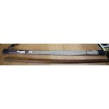 Japanese wooden training sword with cloth case, named Eiichi Yokomizo