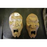 Pair of West African Grotesque Masks