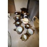 Selection copper lustre jugs & mugs