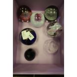 7 glass paperweights: Caithness, Wedgwood, M Jonason