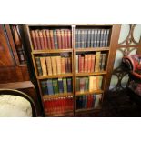 Pair of oak stacking bookcases containing mixed books