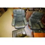 Pair of "Stressless" green leather recliners and foot stools