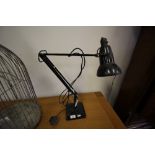 Black Anglepoise style lamp