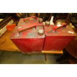 3 vintage red metal fuel cans, funnel and a plastic fuel can