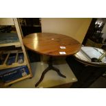 Yew wood circular tripod table (a.f.)