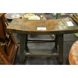 Small 19th century concave seat 4 legged stool, with remains of original green stain