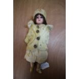 Bisque head doll in original clothes