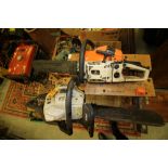 2 petrol chain saws