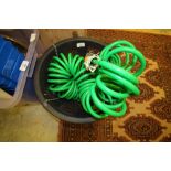 Coiled extending hose and large hanging basket