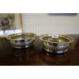 Pair of 19th Century plated wine/bottle coasters, with gadrooned rims, 14.5cm diameter x 5cm high