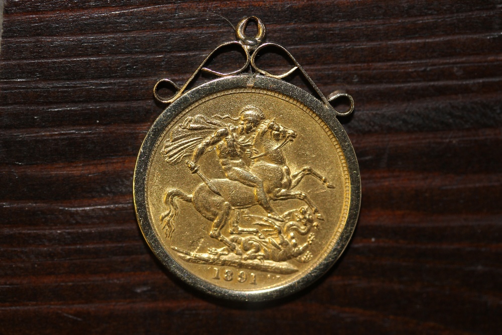 Victoria 1891 Jubilee Head sovereign, contained in 9ct gold mount, 9.3 grams