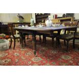 William IV / early Victorian mahogany 'Push-Pull' extending dining table, with two extra leaves,