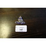 Enamelled white metal Royal Artillery sweetheart brooch, set with diamond chips, 3.5cm wide (a.f.) .