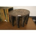 19th Century Ashanti carved wood circular ten-legged stool, 38cm diameter x 25cm high