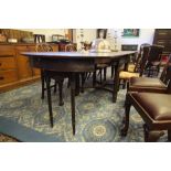 1930's Continental oak and stainded pine extending dining table, with unusual double drawleaf