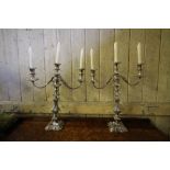 Pair of 19th Century plated three sconce candlebra, with leaf mounts, 48cm high (a.f.)