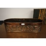 19th Century embossed copper oval planter possibly KSIA, leaf scroll sides and galvanised base, 58cm