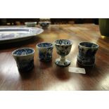 18th Century blue and white pottery egg cup, 5.75cm high, label verso ex. Otto Collection, a pair of