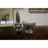 Late Victorian silver sugar caster with panelled sides, 21cm high, Birmingham 1900, and a Edward VII