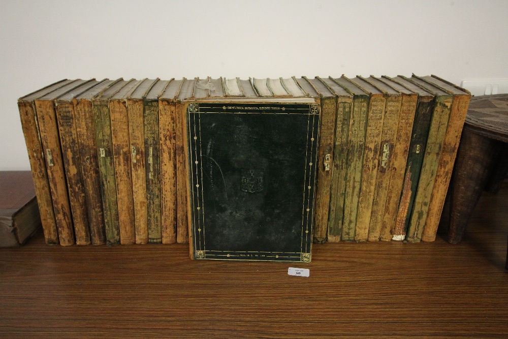 Quantity of early 20th Century green leather bound Encyclopedia Britannica (mostly worn)