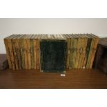Quantity of early 20th Century green leather bound Encyclopedia Britannica (mostly worn)