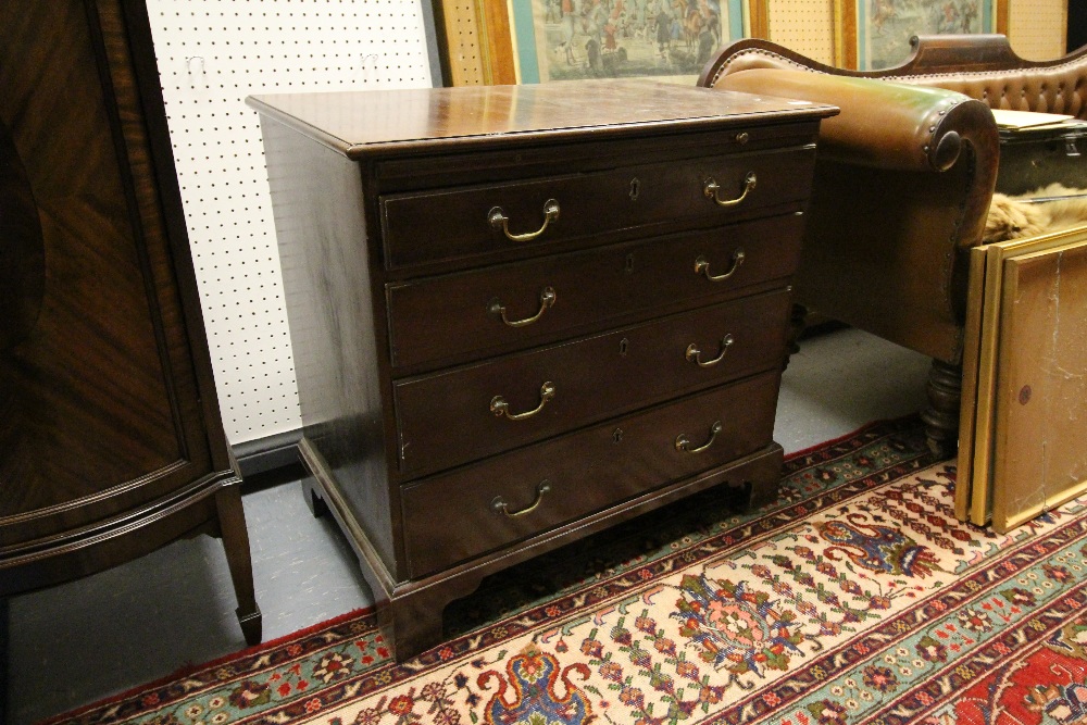 Small George III mahogany chest of drawers, with original handles and brushing slide, 84cm wide x