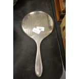 Large silver backed hand mirror