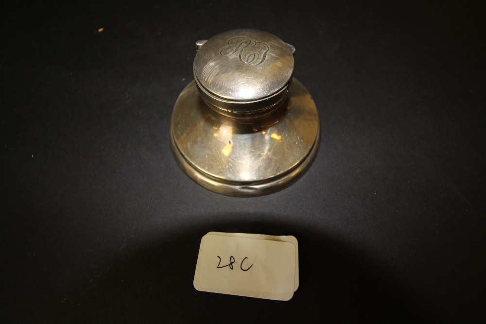 George V silver Capstan inkwell, lid with integral stamp holder, Birmingham 1912, dented, engraved