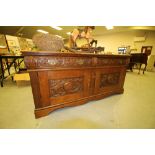 Large carved oak sideboard