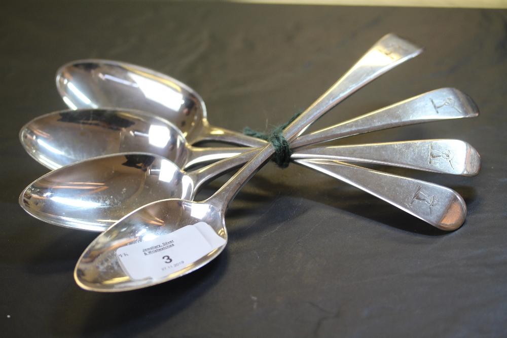 Four Georgian silver serving spoons